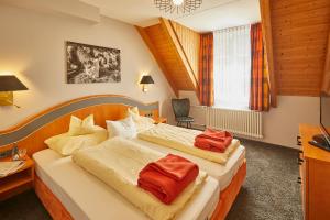 Postel nebo postele na pokoji v ubytování Ferien Residenz Bergfried