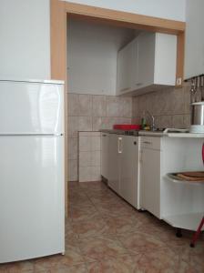 Kjøkken eller kjøkkenkrok på Apartments Atlantida