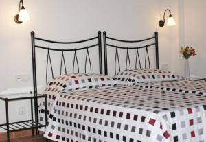 Posteľ alebo postele v izbe v ubytovaní Apartamento Buganvillea + 7 fotografií