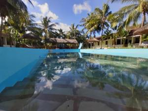 a view of the pool at the resort at Eden House Cottages in Malindi