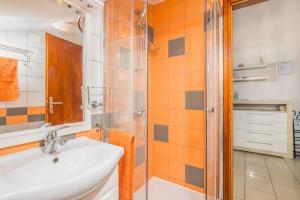 Koupelna v ubytování Apartment Windrose + 17 fotografií