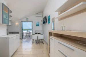 Kuchyň nebo kuchyňský kout v ubytování Apartment Windrose