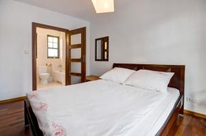 Posteľ alebo postele v izbe v ubytovaní Apartament Haffnera 10