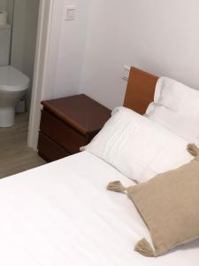 A bed or beds in a room at La casita de Orio