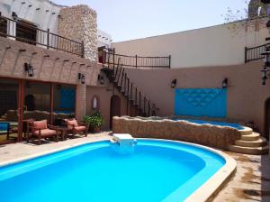 Piscina en o cerca de Al Liwan Suites