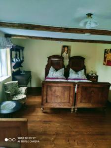 Postel nebo postele na pokoji v ubytování Penzion Nostalgie 1876