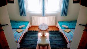 Ένα ή περισσότερα κρεβάτια σε δωμάτιο στο Vila Nela
