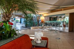 Posezení v ubytování Acacia Resort Parco Dei Leoni