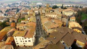 an aerial view of a city with buildings and roofs at B&B "Le tre Muse" in Deruta