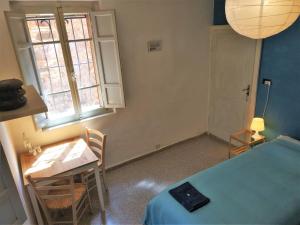 Postel nebo postele na pokoji v ubytování B&B "Le tre Muse"
