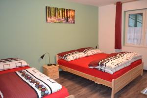 Katil atau katil-katil dalam bilik di Apartment Holiday Lungötz