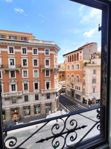 a view of a city from a balcony at Hotel Miami in Rome