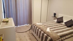 Ένα ή περισσότερα κρεβάτια σε δωμάτιο στο Vila Magna Albufeira +22 φωτογραφίες