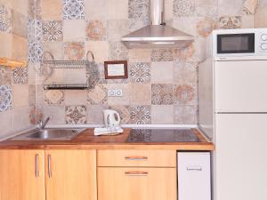 Kuchnia lub aneks kuchenny w obiekcie Apartamentos Jerez