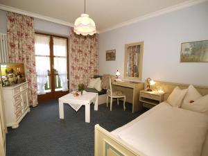 Postel nebo postele na pokoji v ubytování Xundheits Hotel Garni Eckershof