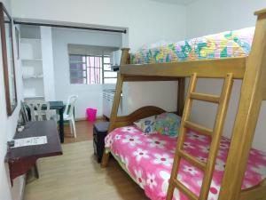 Postel nebo postele na pokoji v ubytování Habita Estudios Laureles