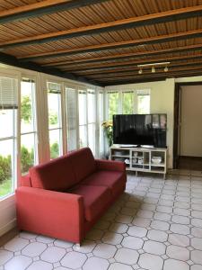 TV a/nebo společenská místnost v ubytování Apartementhaus Helene am Klopeinersee