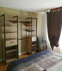 Giường trong phòng chung tại La Citadine maison de ville avec garage +14 ảnh