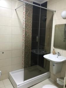 Koupelna v ubytování Dada Lux + 16 fotografií