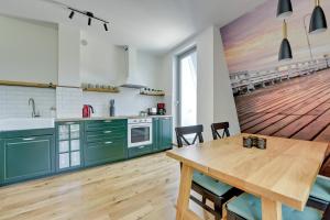 Kuchyňa alebo kuchynka v ubytovaní Comfort Apartments Dolny Sopot