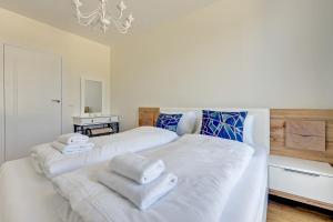 Posteľ alebo postele v izbe v ubytovaní Comfort Apartments Dolny Sopot