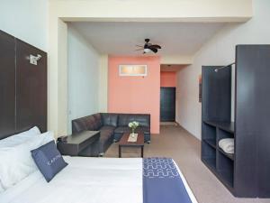 Ένα ή περισσότερα κρεβάτια σε δωμάτιο στο Hotel Spa Shalam