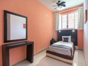 Ένα ή περισσότερα κρεβάτια σε δωμάτιο στο Hotel Spa Shalam