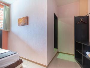 Ένα ή περισσότερα κρεβάτια σε δωμάτιο στο Hotel Spa Shalam