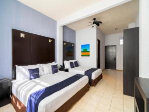 Ένα ή περισσότερα κρεβάτια σε δωμάτιο στο Hotel Spa Shalam