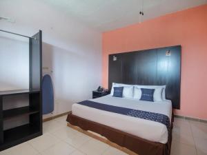 Ένα ή περισσότερα κρεβάτια σε δωμάτιο στο Hotel Spa Shalam