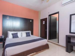 Postel nebo postele na pokoji v ubytování Hotel Spa Shalam + 37 fotografií