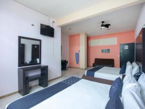 Ένα ή περισσότερα κρεβάτια σε δωμάτιο στο Hotel Spa Shalam