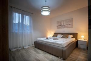 Ένα ή περισσότερα κρεβάτια σε δωμάτιο στο Villa Guliva