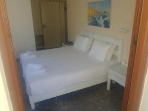 Postel nebo postele na pokoji v ubytování Frida Village