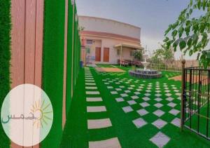 Κήπος έξω από το Shams W Qamar Chalets