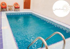 The swimming pool at or close to Shams W Qamar Chalets