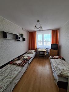 Postel nebo postele na pokoji v ubytování Ośrodek wczasowy Ewa