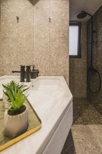 A bathroom at Sun-splashed Stylish Flat, steps to City Old Town Még 25 kép