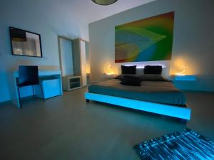 TV a/nebo společenská místnost v ubytování B&B La Perla & Suites