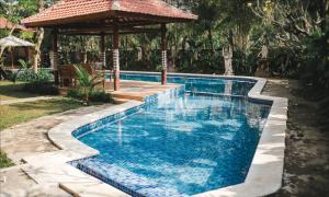 Bassein majutusasutuses Ubud Hotel & Cottages või selle lähedal