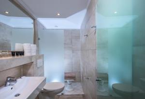 Koupelna v ubytování Hotel Matheo Villas & Suites