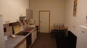 A cozinha ou cozinha compacta de Hostel im Medizinerviertel