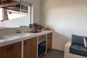 Kuchyňa alebo kuchynka v ubytovaní Boutique apartment with beach within walking distance, near Tropea