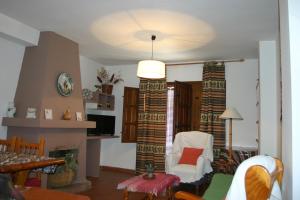 Posedenie v ubytovaní Apartamentos y Casas Rurales Las Terrazas de la Alpujarra
