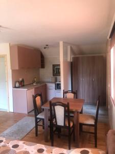 A kitchen or kitchenette at Apartments Bogdanović