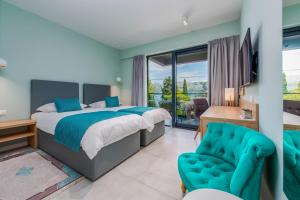 Postel nebo postele na pokoji v ubytování Hotel Seventh