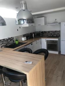 A cozinha ou kitchenette de Maison bord mer