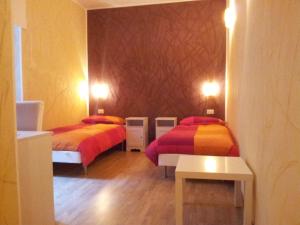 Posteľ alebo postele v izbe v ubytovaní B&B In Piazza