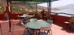 
A restaurant or other place to eat at Tigmi Dar Samy
