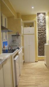Kuchyňa alebo kuchynka v ubytovaní B&B In Piazza